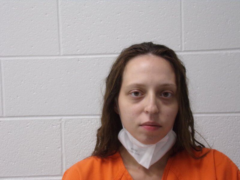 Cumberland woman charged in West Side knife assault